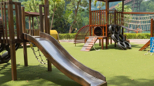 Top 6 Benefits of Choosing Artificial Grass for a Playground - Tuda Grass